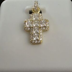 Elegant Gold and Silver Cross Pendant